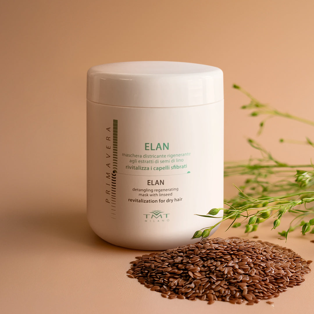 immagine della maschera districante rigenerante su sfondo rosa chiaro con semi di lino e piante verdi